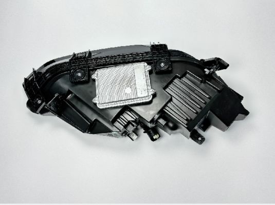 L'assemblaggio del proiettore di illuminazione a sinistra